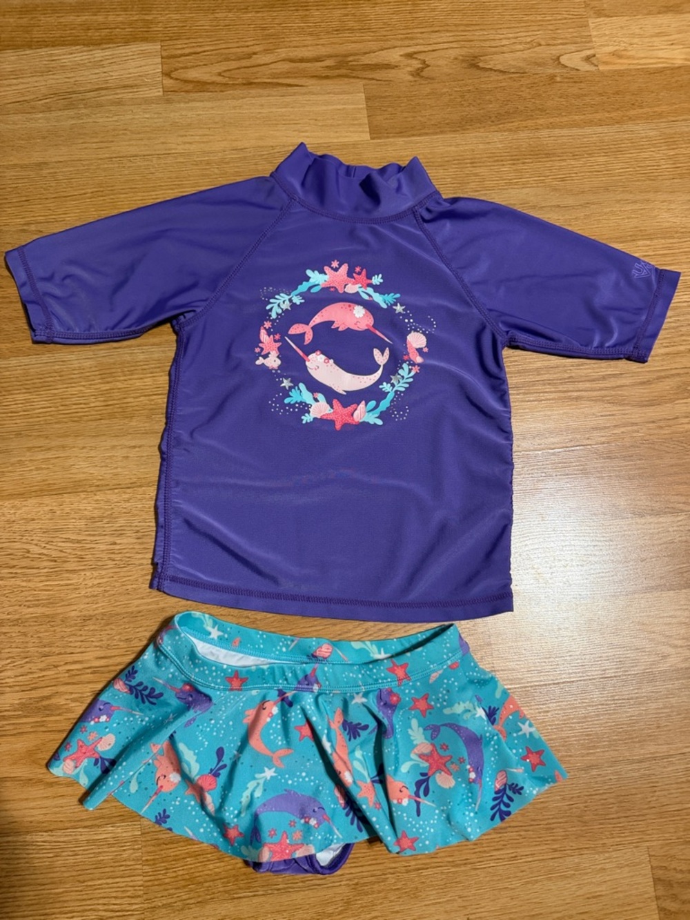 Girls Narwhal Swimsuit Size 7
UV Skinz UPF 50+ Sunwear 2 Piece